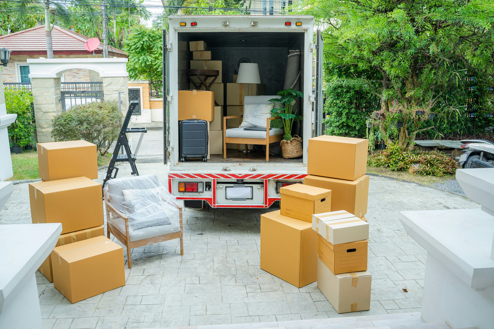 House moving service,Boxes waiting to be moved into a new home.